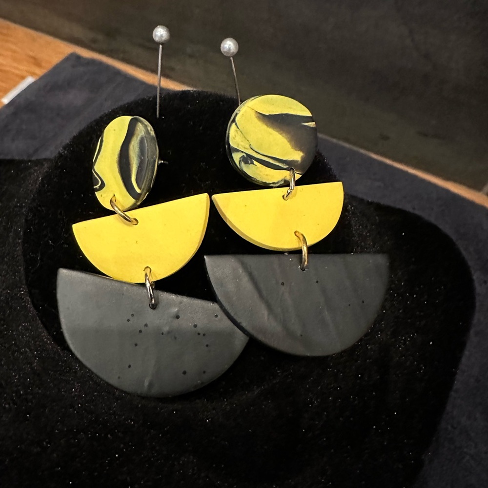 Black and Yellow Clay Paddle Earrings. Made by hand, no two are exactly alike.